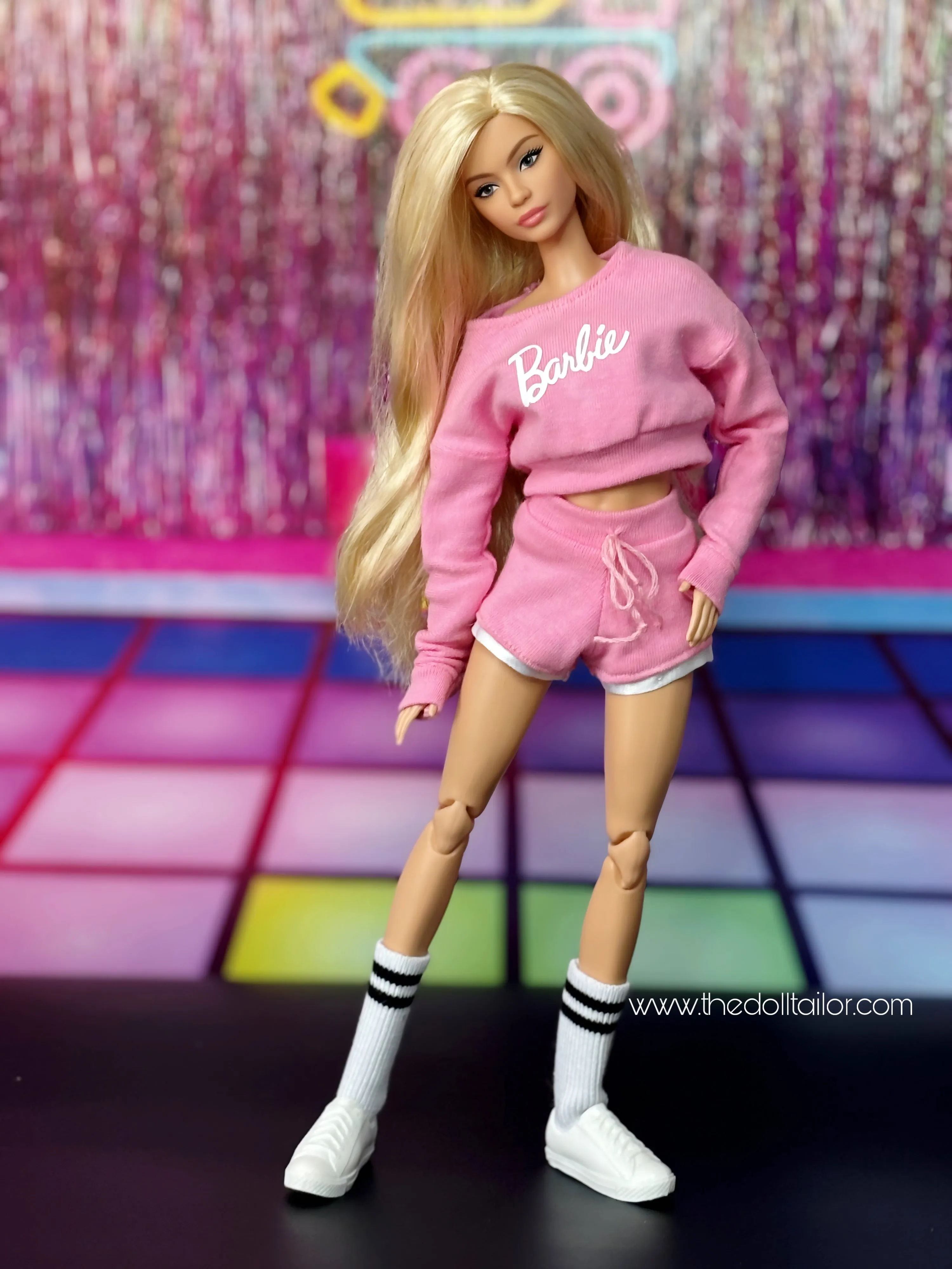 Pink sweater and shorts for barbie dolls