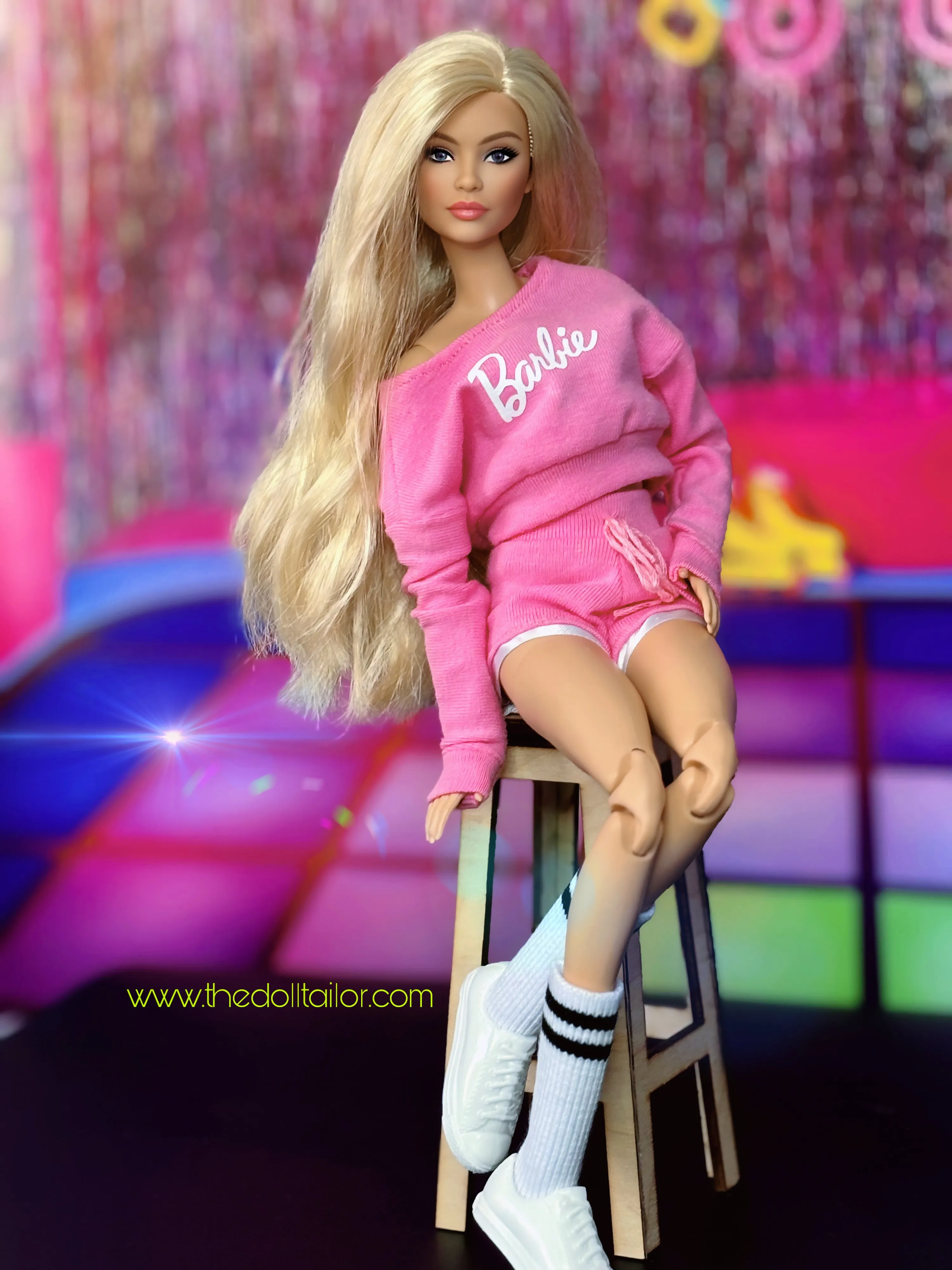 Pink sweater and shorts for barbie dolls