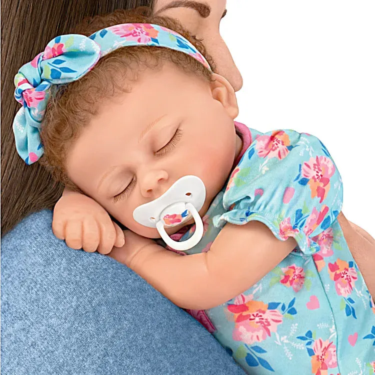 The Ashton - Drake Galleries Bella Interactive Lifelike TrueTouch® Authentic Silicone Baby Girl Doll Breathes and Coos Weighted Fully Poseable with Custom Floral Sleeper & Headband by Artist Linda Murray 19"-inches