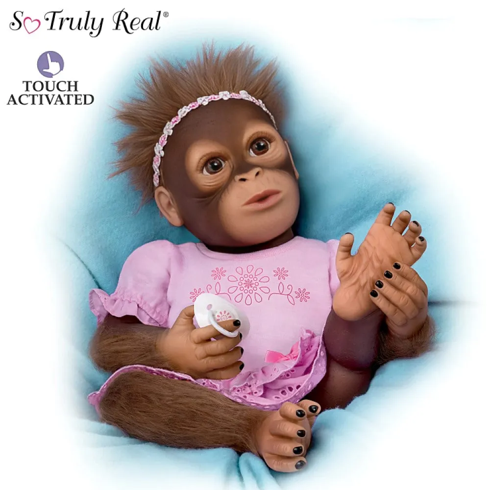 The Ashton - Drake Galleries Cooing Cora Baby Girl Monkey Doll Coos and Breathes So Truly Real® Lifelike Hand Applied Mohair RealTouch® Vinyl Skin Fully Weighted and Poseable for Realism 18-inches