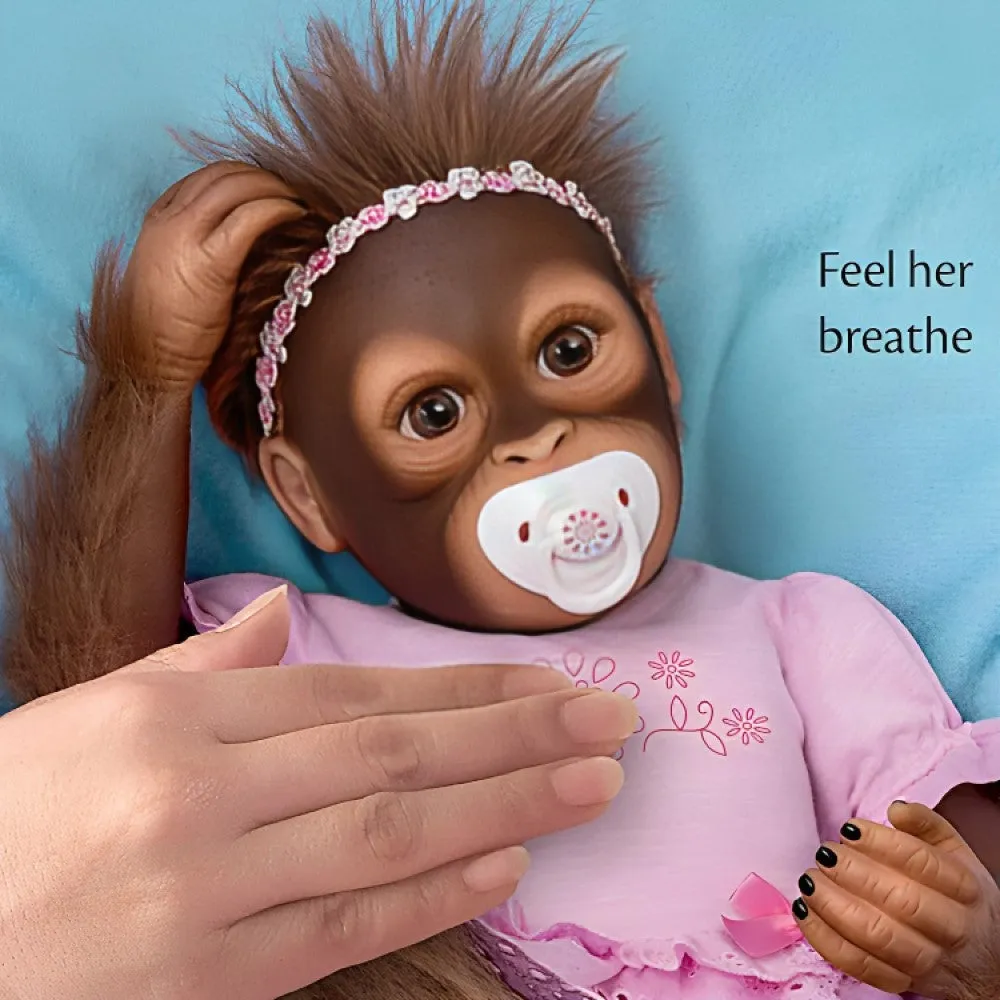 The Ashton - Drake Galleries Cooing Cora Baby Girl Monkey Doll Coos and Breathes So Truly Real® Lifelike Hand Applied Mohair RealTouch® Vinyl Skin Fully Weighted and Poseable for Realism 18-inches