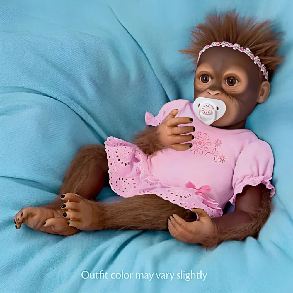 The Ashton - Drake Galleries Cooing Cora Baby Girl Monkey Doll Coos and Breathes So Truly Real® Lifelike Hand Applied Mohair RealTouch® Vinyl Skin Fully Weighted and Poseable for Realism 18-inches